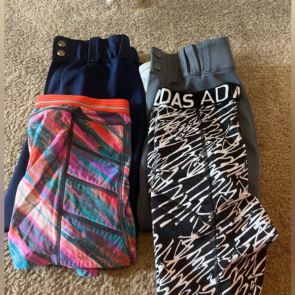 2 Pairs of softball pants and sliding shorts